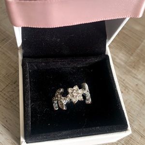 Sterling Silver ring with flowers around band
